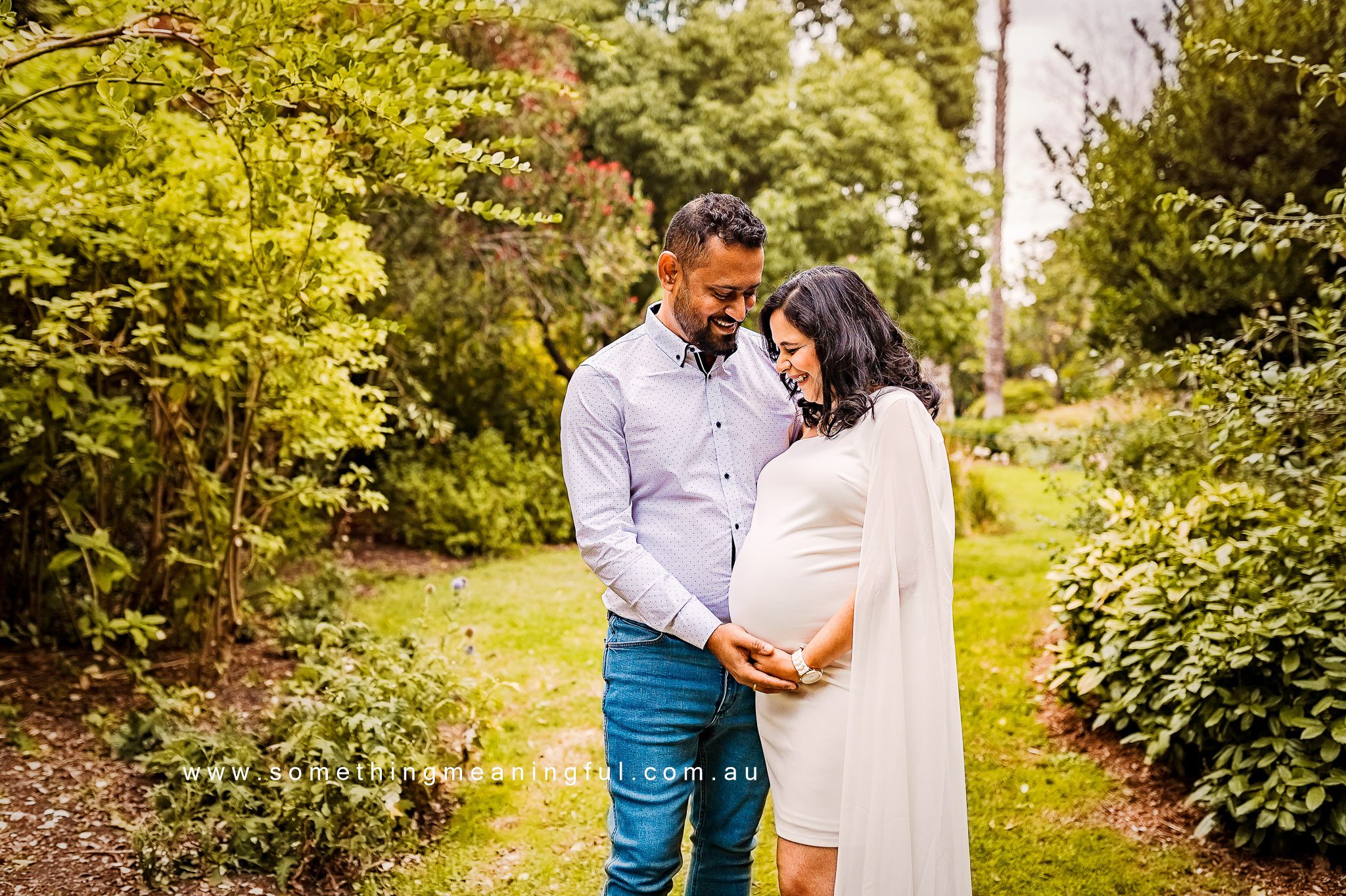 Joyful expecting couple embracing, capturing the anticipation of parenthood during Maternity Photography Melbourne West